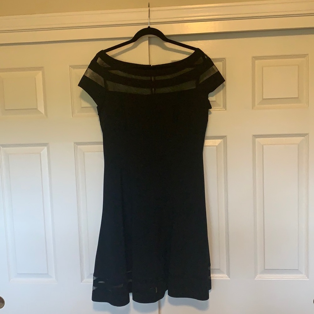 Little black dress with chiffon detail.